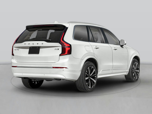 A white 2026 Volvo XC90 SUV from the rear with black wheels, showcasing sleek lines and modern design.