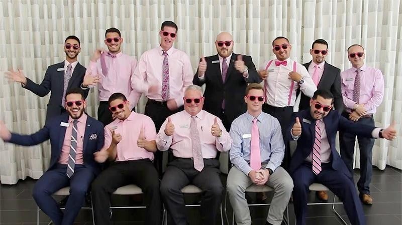 group of men wearing in pink